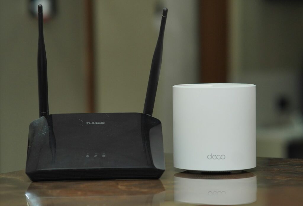 Wi-Fi router and mesh unit on a desk